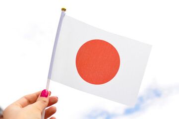 Close up of national flag of Japan round red circle on white background