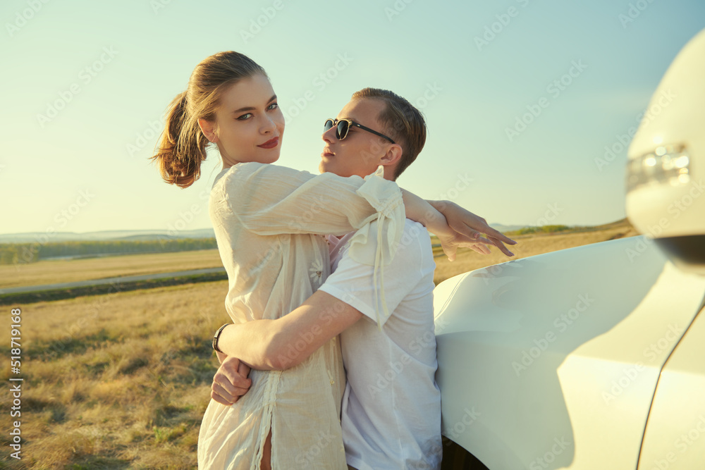 Poster lovers travelling by car