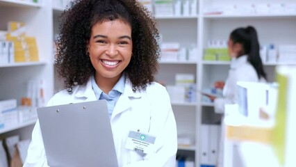 Portrait of a happy pharmacist working in a chemist. Face of a beautiful young female healthcare worker and pharmacy assistant taking a break from stocktake and dispensing prescription medication.