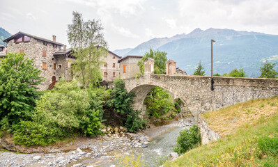 Fototapeta na wymiar View at the Combo bridge over Adda river in Bormio - Italy