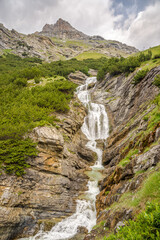 View at the Braulio Waterfall on the road to Stelvio Pass - Italy