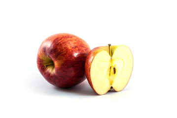 Red apples whole and halves piece isolated on white background.