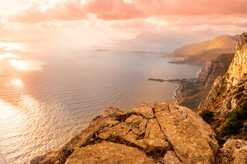 amazing panoramic view from a high rock to  sunset or sunrise sea in evening or morning with coastline