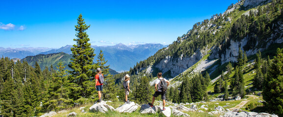 family hiking in the mountain- France,  massif des Bauges - obrazy, fototapety, plakaty
