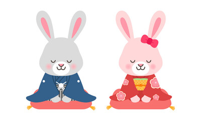 お正月イメージイラスト　座布団に座っている着物を着たウサギのペア　