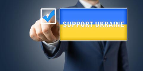 Support of Ukraine concept, official person or politician man in the suit pushes button on ukrainian flag