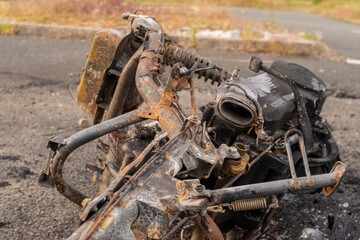 Newburn England: 16.06.2022: stolen motorbike set on fire burned out and abandoned on industrial...