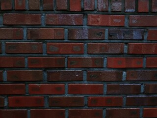 wall of red brick house
