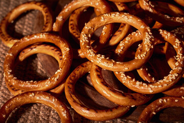 Bagels sprinkled with sesame seeds. Close-up, patern photo.Bagels sprinkled with sesame seeds. Close-up, patern photo.