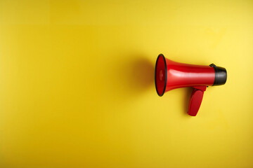  megaphone against yellow background
