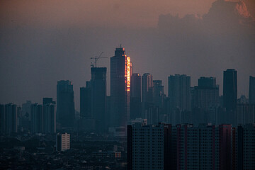skyscrapers in the city at sunset