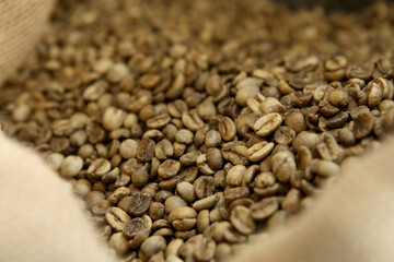 Innovative coffee roaster. The coffee is roasted using high technology in a production machine. Lots of coffee in the vat.