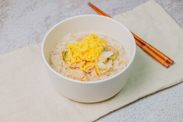 This dish consists of buckwheat noodles served in chilled chicken soup flavored with vinegar and mustard and topped with shredded chicken. Chogyeguksu is a dish commonly eaten in summer as it is belie