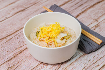 This dish consists of buckwheat noodles served in chilled chicken soup flavored with vinegar and mustard and topped with shredded chicken. Chogyeguksu is a dish commonly eaten in summer as it is belie