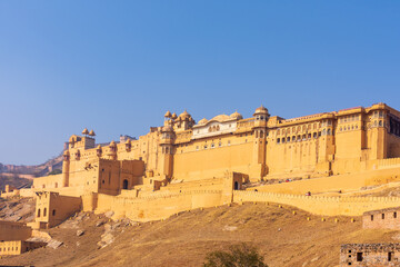 A view of the beautiful Amber Fort on a sunny day in Jaipur, Rajasthan, India.