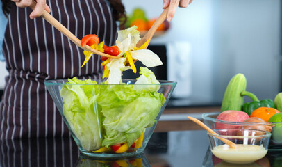 beautiful asian female at kitchen
