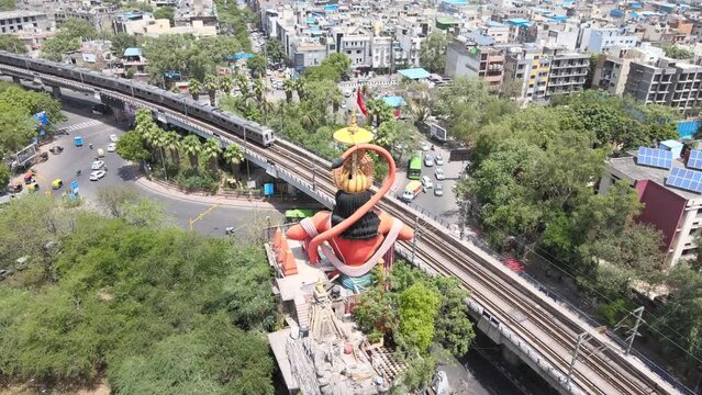 An Aerial Shot of Hanuman statue and Delhi Metro at Jhandewalah, New Delhi,India