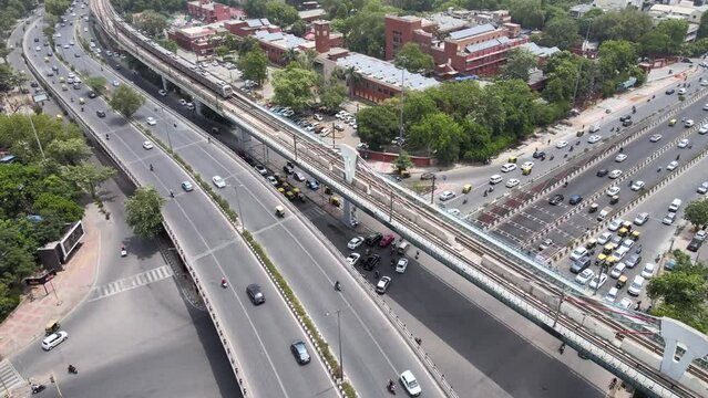 An Aerial Shot of Delhi Metro and Traffic movement at Moolchand Flyover in New Delhi,India