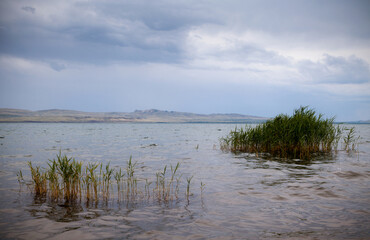 Clouds over the lake. Nature landscape background.