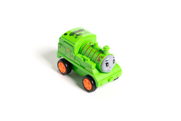 Fototapeta premium Colorful plastic train, isolated on white background.