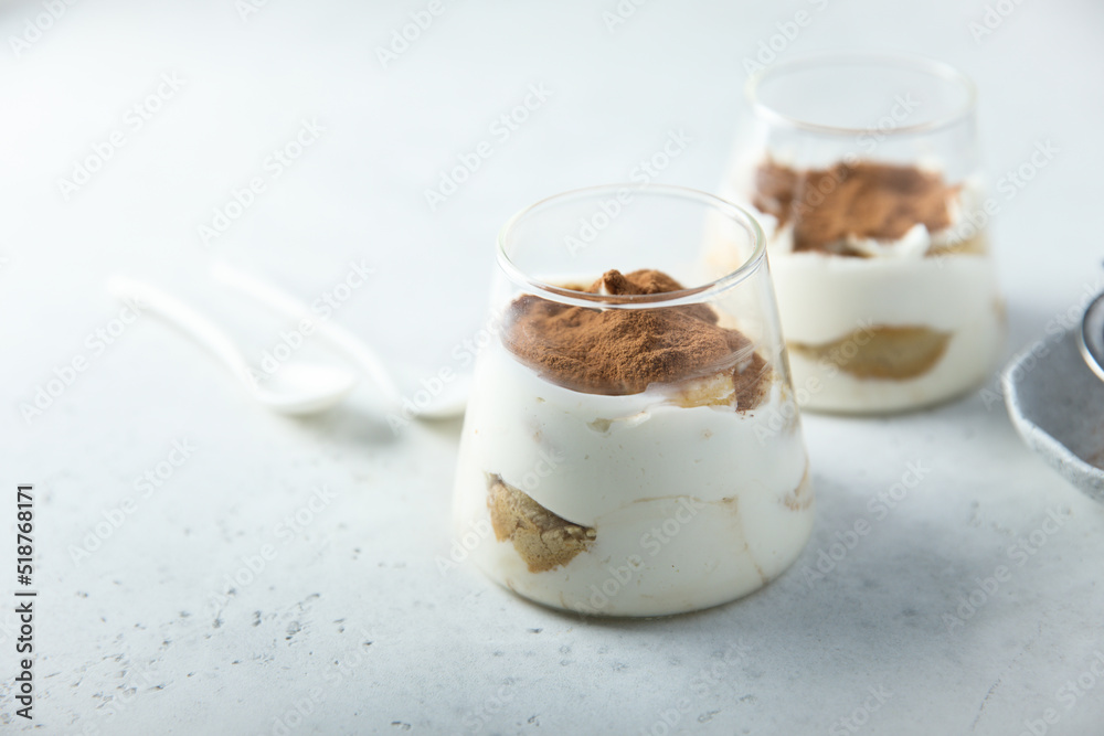 Poster traditional homemade tiramisu dessert served for two