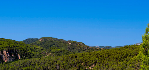 Obraz premium Beautiful panoramic view of wild countryside in summer