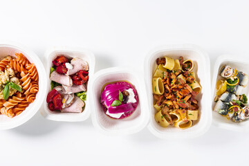 Collection of white plastic take away boxes with healthy food. Set of containers with everyday meals - meat, vegetables and law fat snacks on white background