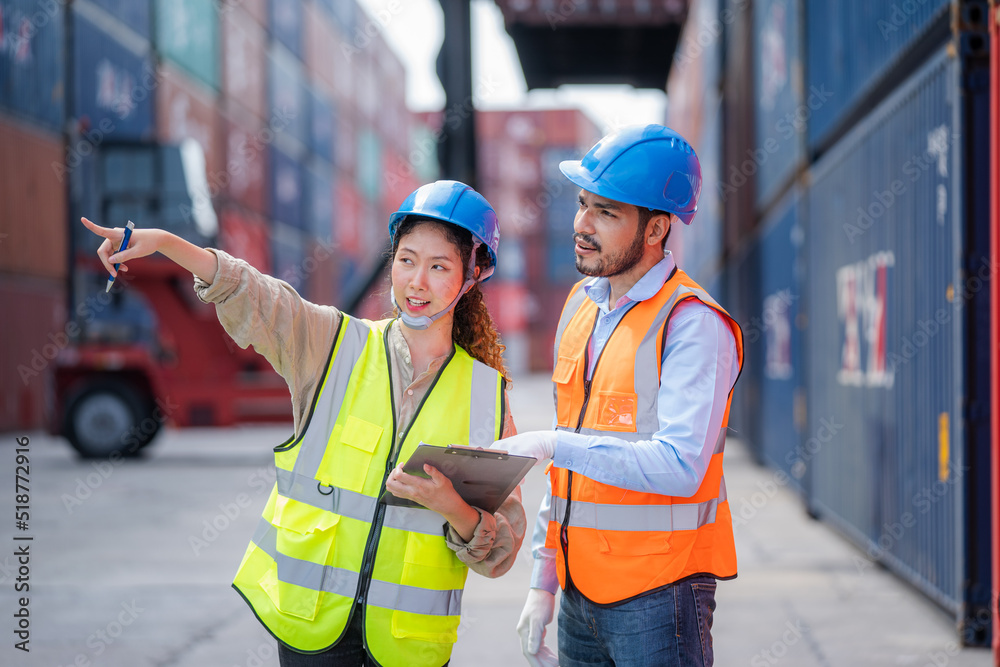 Poster Engineer and inspector working and discuss in shipping container in Container Terminal.