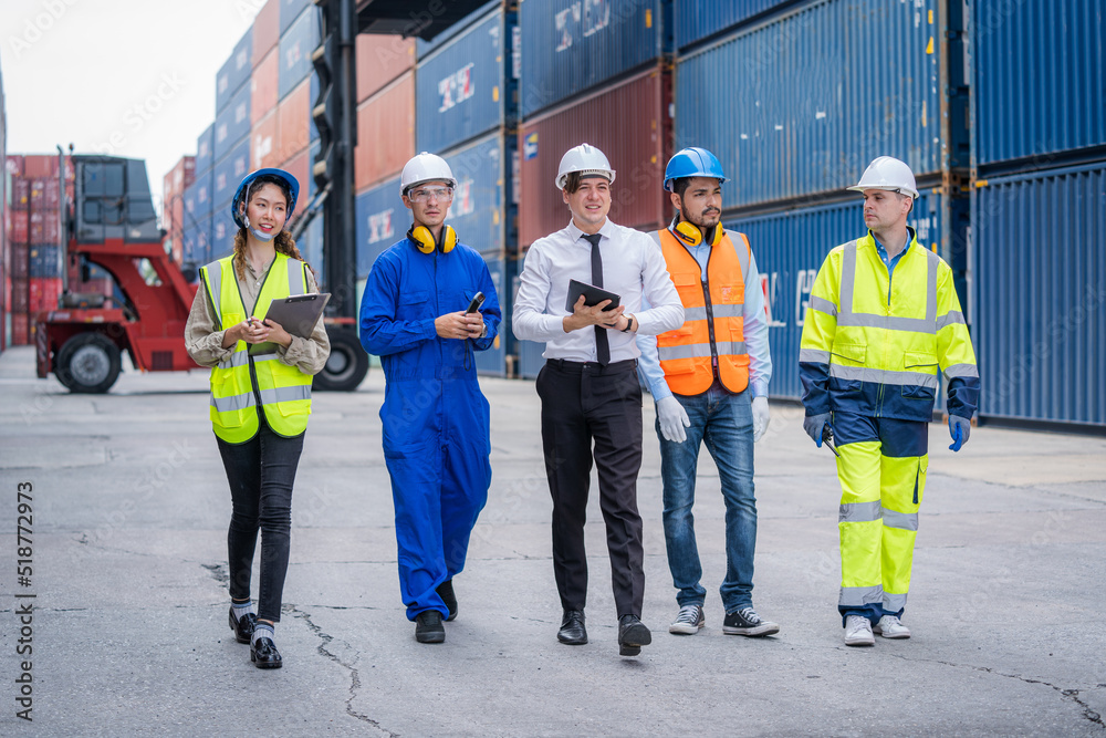 Aufkleber Technicians or engineer with worker walking and discuss together about work in cargo container workplace area,logistic and business export.
