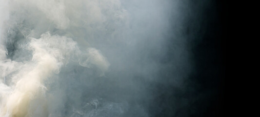 Fototapeta premium Panoramic view of the abstract fog or smoke on black background. White cloudiness, mist, or smog background.