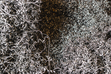 Metal shavings. Background. Waste after metal processing on a lathe.