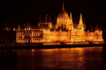 Panoramic night view of the Hungarian Parliament in Budapest at night. travel and tourism concept....