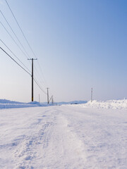 Fototapeta na wymiar 北海道の冬の小道