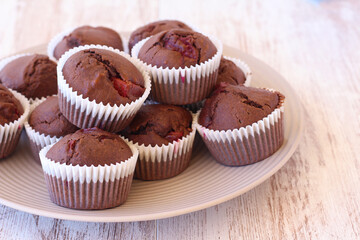 Chocolate muffins with plums
