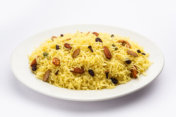 Kashmiri sweet modur pulao made of rice cooked with sugar, water flavored with Saffron and dry fruits