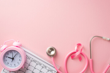 Breast cancer awareness concept. Top view photo of stethoscope pink ribbon alarm clock and calendar on isolated pastel pink background with copyspace