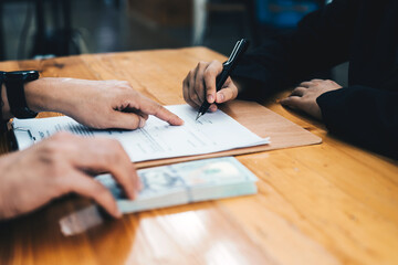 Entrepreneurs are receiving money that is a bribe of their partners with both of whom are corrupt in the company room