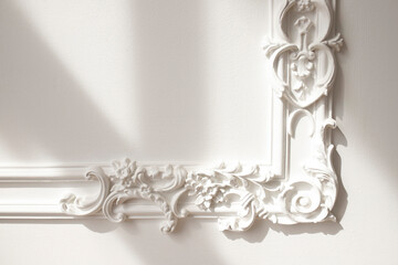 Decorative clay stucco relief molding with ornaments on white ceiling in abstract classical style...