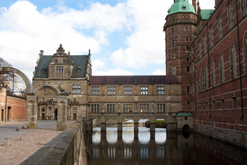 Fototapeta na wymiar Frederiksborg Slot or Castle in Hillerod, Denmark. This famous danish palace was built as a royal residence for King Christian IV and is now known as The Museum of National History.