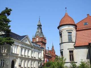 Fototapeta na wymiar Three styles of the architecture of Lembork, Poland