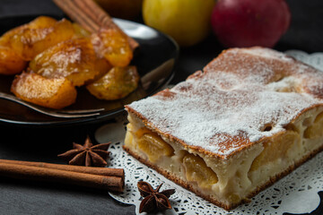 Plum dessert on a black background. Fruit home cooking. fruit dessert