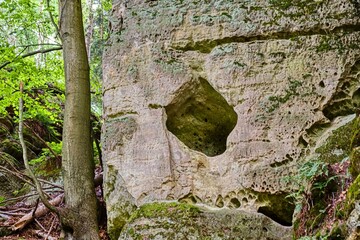 view through a cliff in the valley with moss on a mountain lake in the north of the state