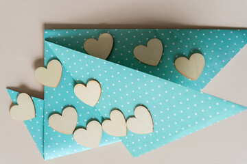wooden hearts and fancy blue paper with dots