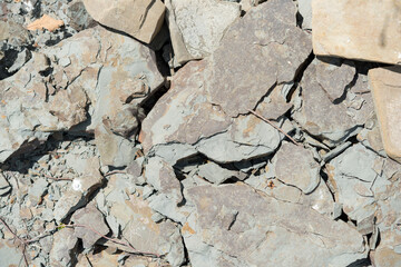 broken rocks on the river bank