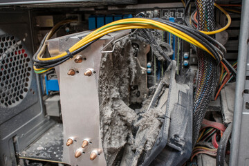 Close-up of a cpu cooling system heatsink contaminated with dust that can no longer cool the computer