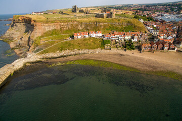 Fototapeta premium Whitby Abbey was a 7th-century Christian monastery that later became a Benedictine abbey. Whitby, Yorkshire seaside town resort and fishing port 
