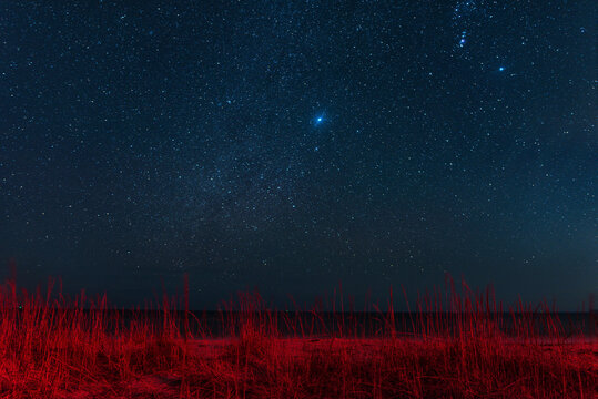 View of the sea on a moonlit night made with long exposure. Night sky. Stars. Ochakov. Ukraine