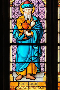 Ploumilliau (Plouilio), France. Stained glass window depicting Saint Joseph of Arimathea with the holy grail inside St Miliau Church