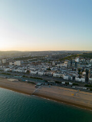 Fototapeta premium Vertical aerial photo sunset over Brighton Beach UK