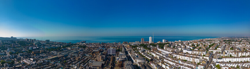 Fototapeta na wymiar Aerial panorama of Brighton Beach summer scene circa 2022